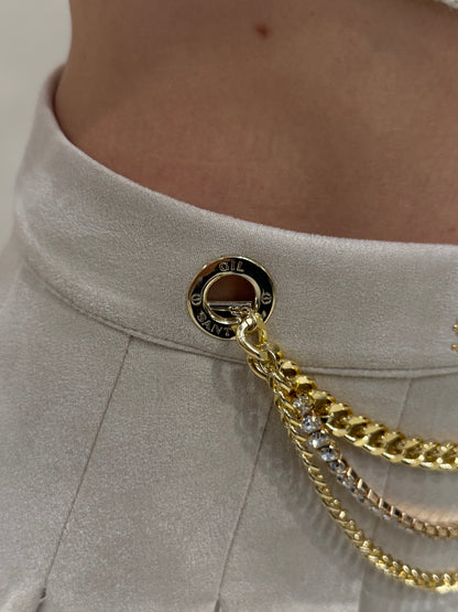 Minigonna a pieghe in camoscio sintetico color panna