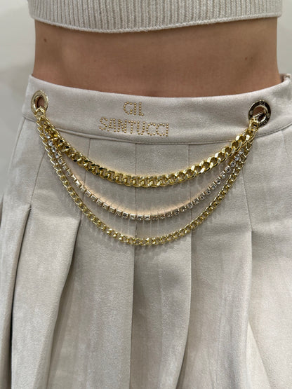 Minigonna a pieghe in camoscio sintetico color panna